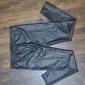 Faux leather leggings with knee slashes